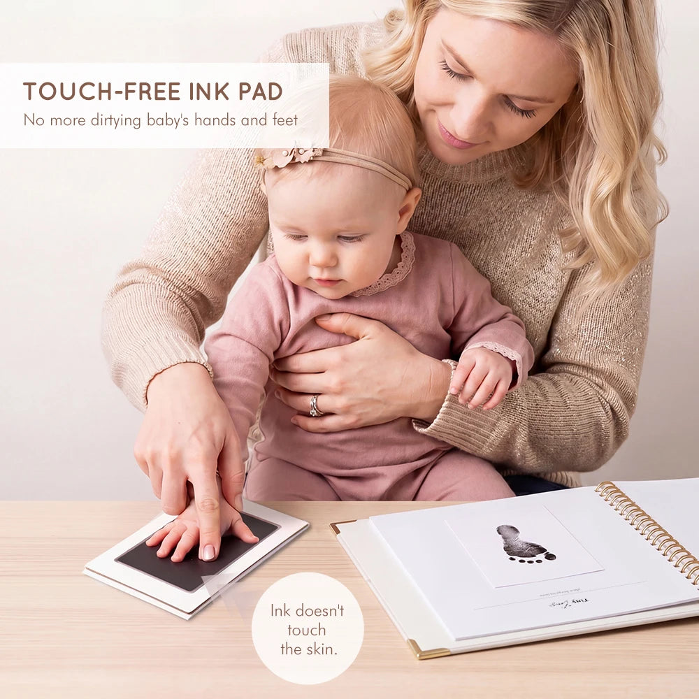 Demonstrating the mess-free, non-toxic inkless ink pad from Molekaus, designed for safely capturing your newborn's delicate hand and foot prints without any direct skin contact.