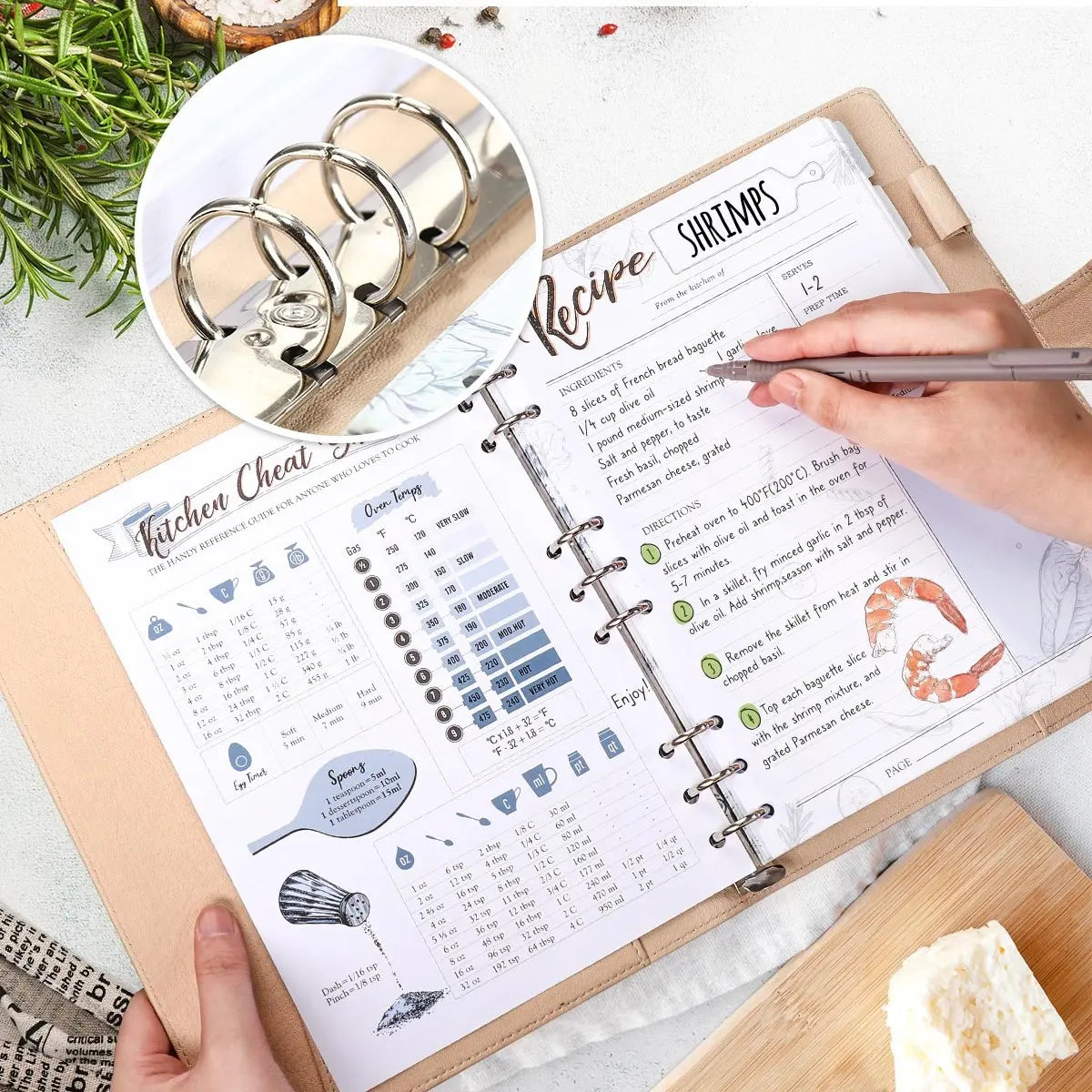 Interior view of the Molekaus refillable 3-ring recipe binder, showcasing a built-in kitchen cheat sheet and a handwritten family recipe page.